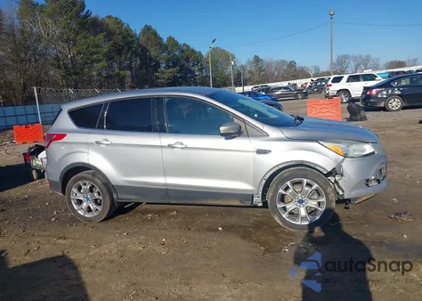 2013 Ford Escape Sel z USA, uszkodzony, nr VIN 1FMCU0H93DUA79422